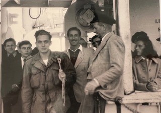 Gabor-Hamory-1949-onboard-a-ship-to-Australia-(Gabor-is-in-the-uniform.jpg
