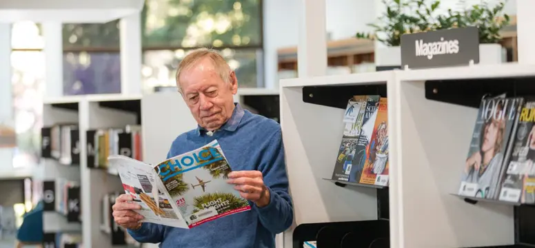 Man reading at library