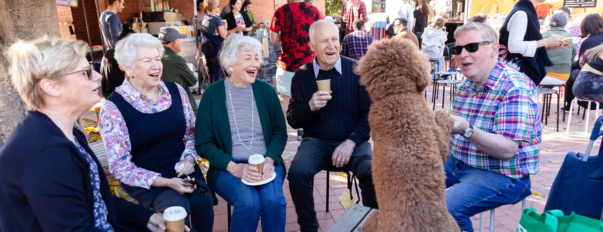 Subi-Farmers-Market-community-and-dog-chatting.jpg