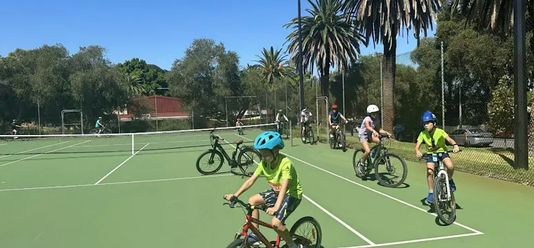 kids on bikes.png