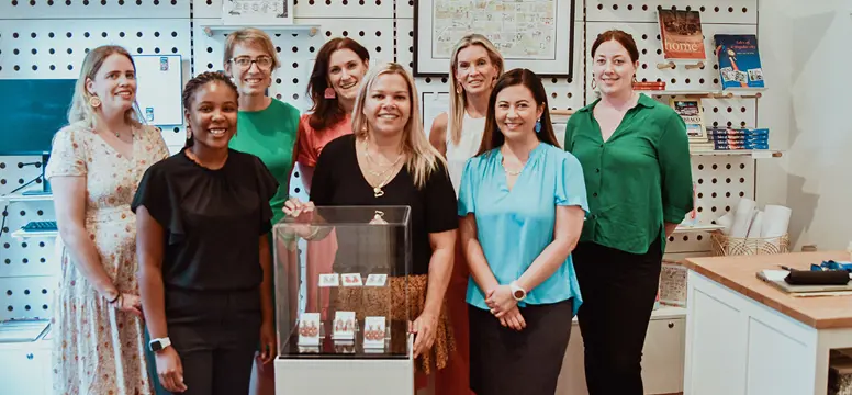 City staff with Museum earrings